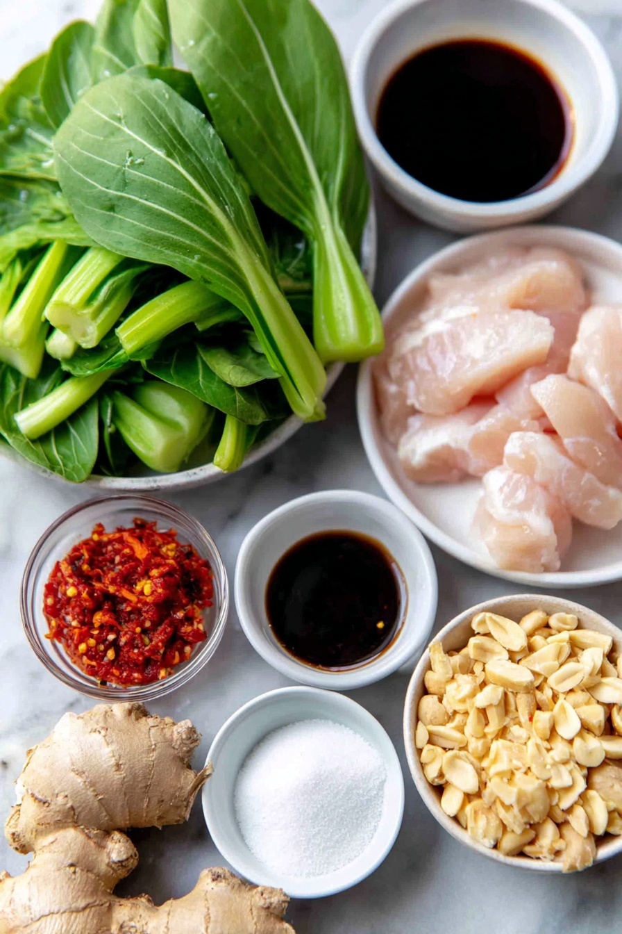 Flat lay of a small knob of fresh ginger root, six whole garlic cloves, a medium red onion quartered into chunks, thin sliced boneless chicken breast strips arranged neatly, roughly chopped baby bok choy leaves, a handful of fresh Thai basil leaves, a small white ceramic bowl with reduced sodium soy sauce, a small white ceramic bowl with rice vinegar, a small white ceramic bowl with toasted sesame oil, a small white ceramic bowl with granulated sugar, a small white ceramic bowl with cornstarch powder, a small white ceramic bowl with red chili paste, a small pile of dry-roasted peanuts (crushed), and a small white ceramic bowl of vegetable oil, all arranged with perfect symmetry and balanced proportions, placed on a clean white marble surface, soft natural light, photo taken with an iPhone, professional food photography style, fresh ingredients, white ceramic bowls, no bottles, no duplicates, no utensils, no packaging --ar 2:3 --v 7 --p m7354615311229779997