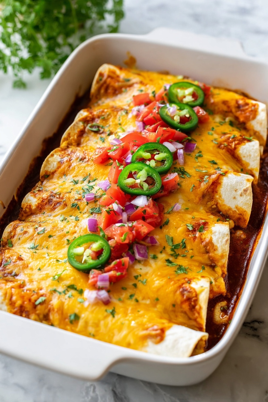 A white baking dish holds five rolled enchiladas side by side, each covered with melted yellow and white cheese that looks smooth and slightly browned in some spots. Under the cheese, a red sauce peeks out, adding a deep color contrast. On top, there are small pieces of diced red tomatoes and finely chopped purple onions spread evenly across the enchiladas. In the middle of the dish, there are three slices of green jalapeño peppers placed on top of the cheese and vegetables. The white marbled surface underneath the dish adds a clean, bright look to the image. photo taken with an iphone --ar 2:3 --v 7