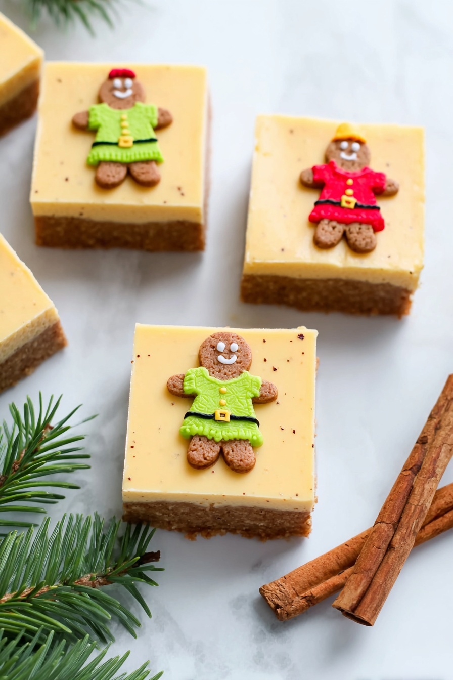 The image shows four square layered desserts on a white plate with a white marbled surface. Each dessert has three layers: a rough-textured dark brown bottom crust, a thick, light beige middle layer with a soft, creamy texture, and a smooth light tan top layer. On top of each dessert is a small gingerbread man decoration with red and black details. The focus is on one dessert in the middle, showing the layers clearly. Photo taken with an iphone --ar 2:3 --v 7